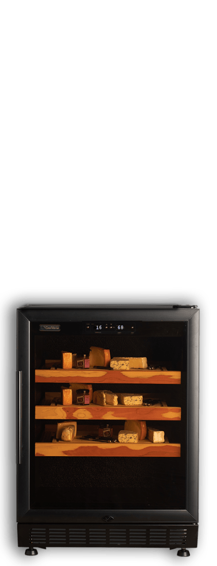 Cheese storage cabinet with glass door containing shelves of various cheese blocks, placed against a black background.