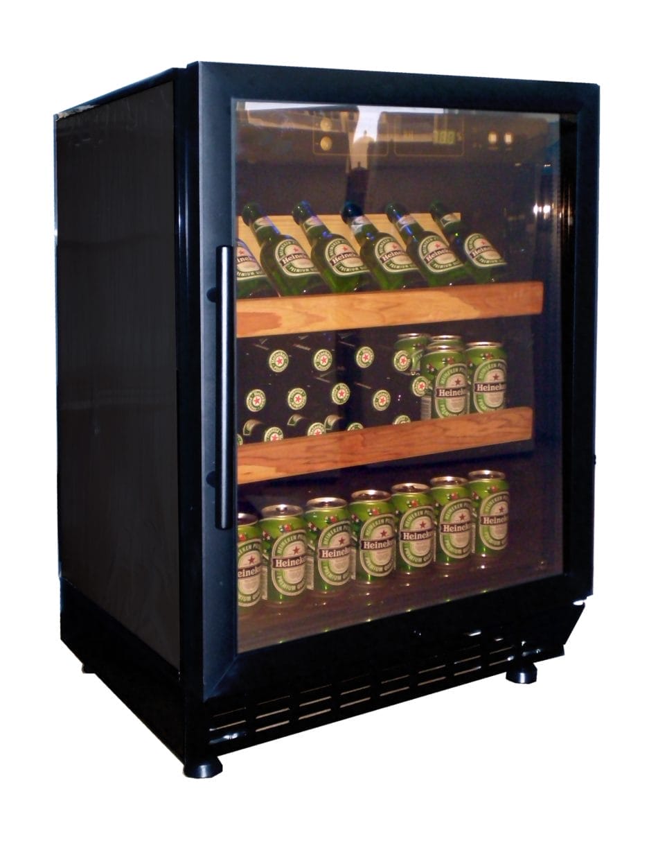 A black drinks cooler filled with rows of canned drinks on wooden shelves, illuminated by interior lighting.